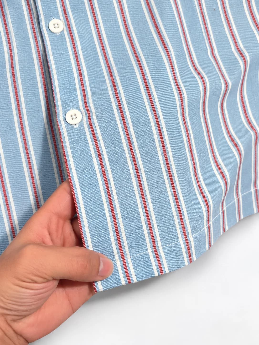 MaleWear Sky Blue Vertical Striped Men's Casual Shirt Close-Up with Red and White Stripe Pattern, White Buttons and Curved Hem