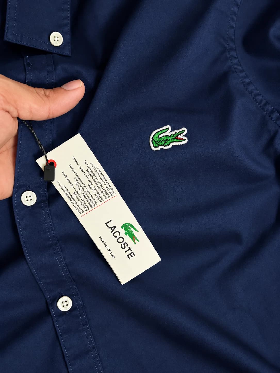Lacoste Men's Premium Navy Blue Solid Shirt with Green Crocodile Embroidered Chest Logo, White Buttons and Brand Hang Tag